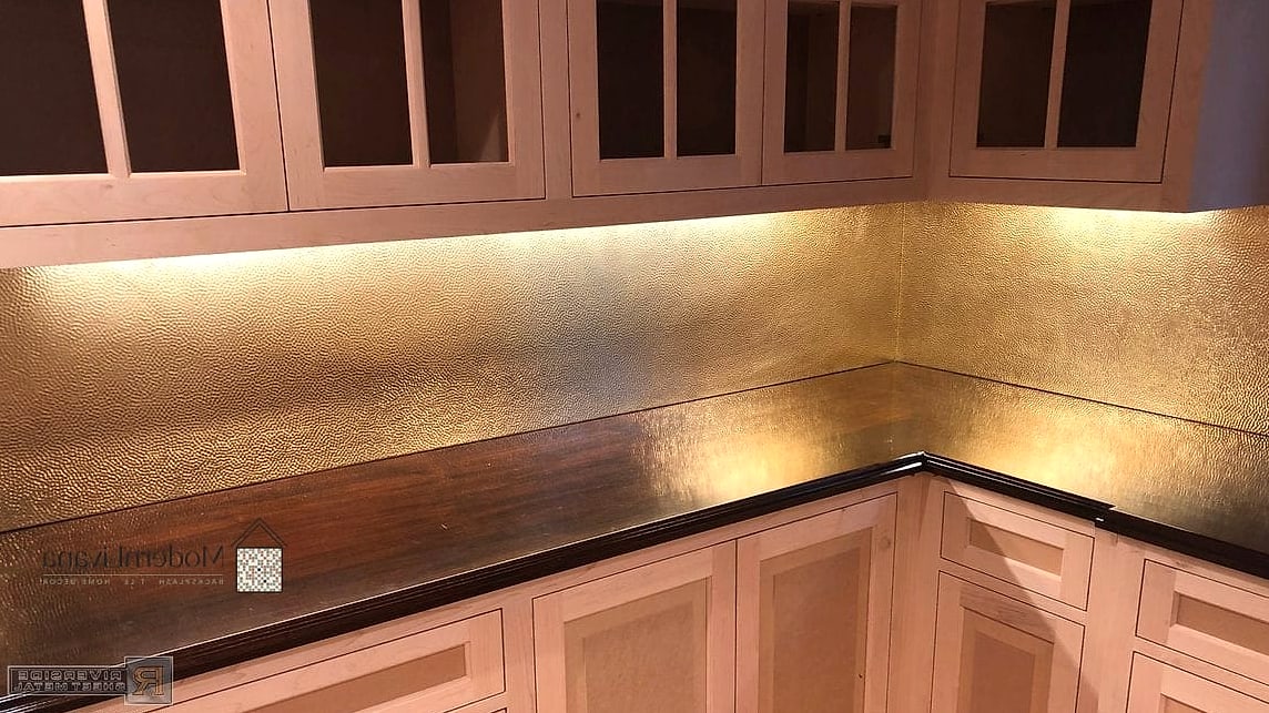 24 Brass Backsplash Ideas That Maximize Style and Function 3 Antique Brass with Dark Green Cabinets