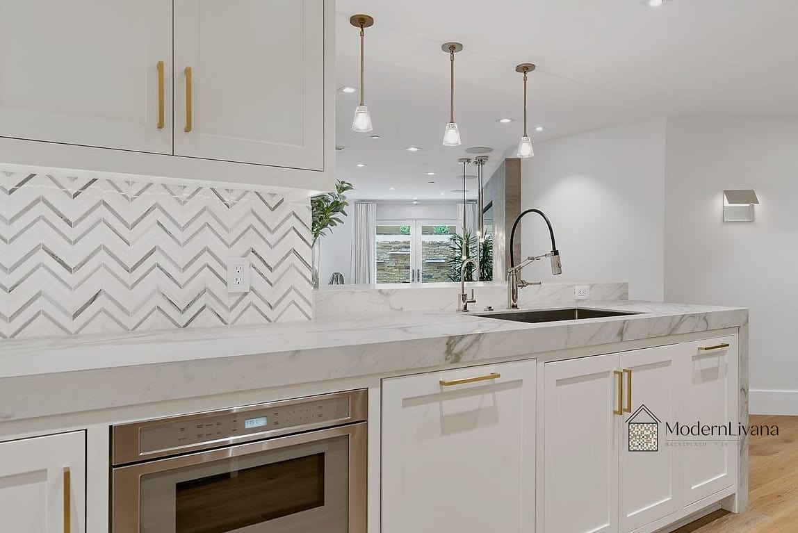 28 White Chevron Backsplash Ideas That Maximize Style and Function 17 Chevron Behind a Vent Hood