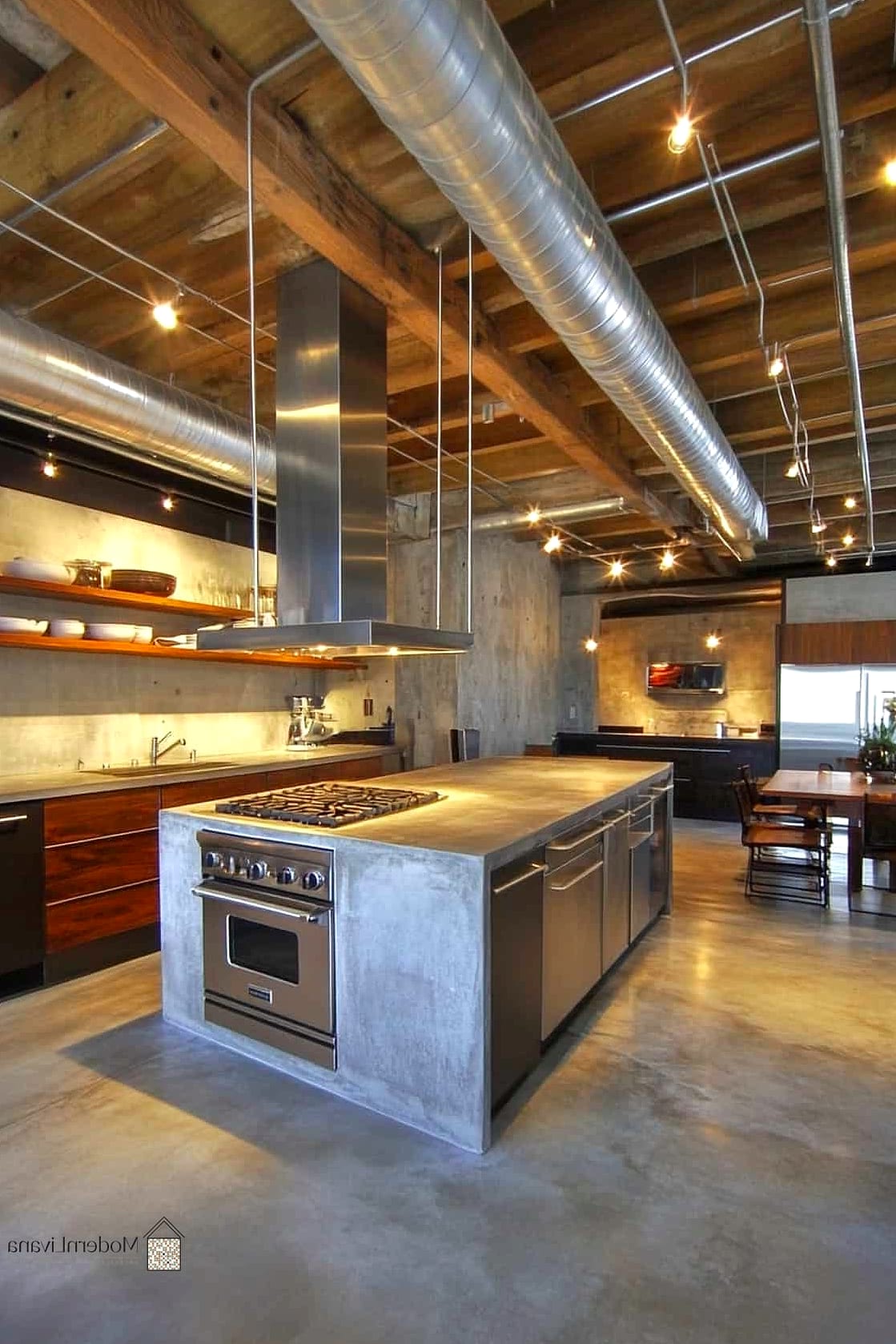25 Industrial Kitchen Ideas From Homes We Absolutely Love 4 Concrete Countertops with Warm Wood Accents