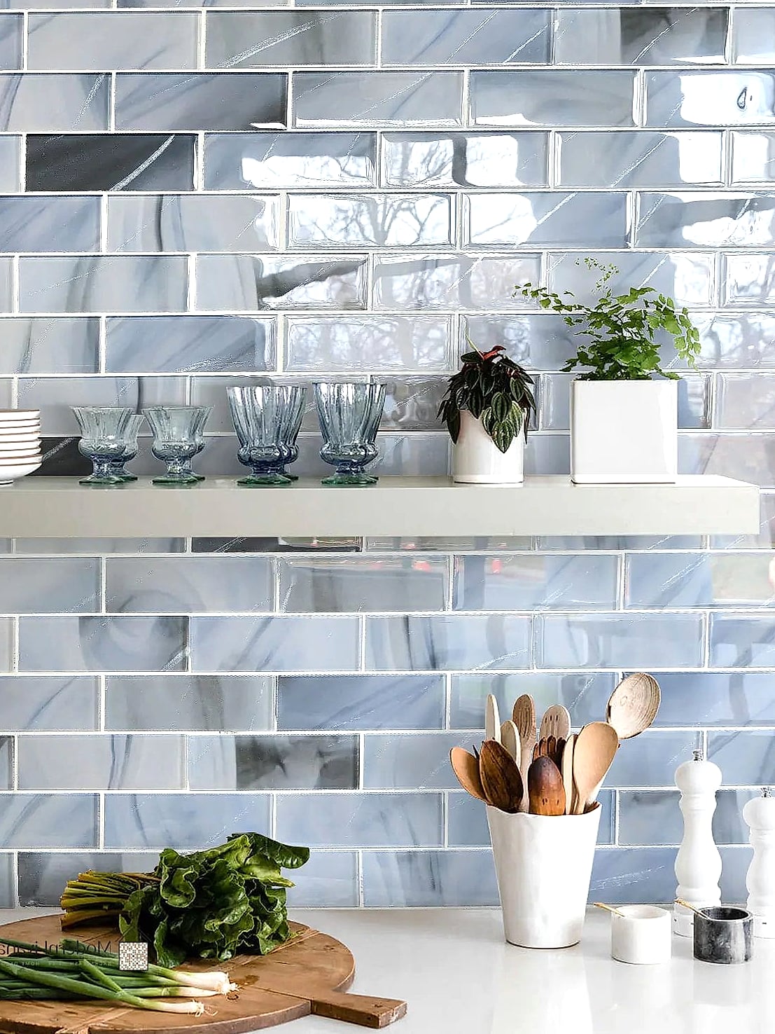 20 Kitchen Backsplash Ideas That Will Transform Your Space 8 Glass Tile for a Bright and Reflective Space