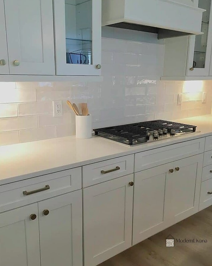 26 White Backsplash Ideas That Will Transform Your Space 3 Glossy White Subway Tile for a Brighter Kitchen