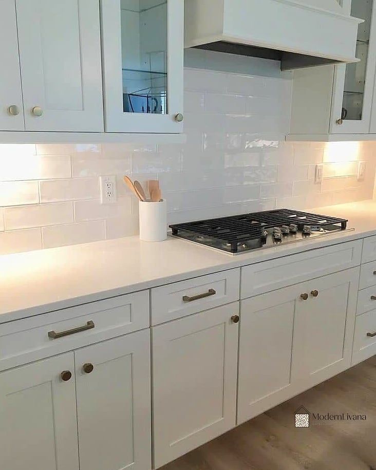 23 White Backsplash Ideas That Will Transform Your Space 3 Glossy White Subway Tile for a Bright Kitchen