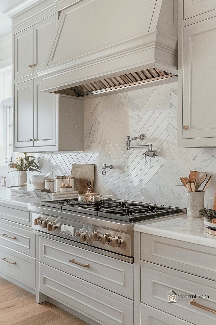 Gray Cabinets with a Herringbone Backsplash