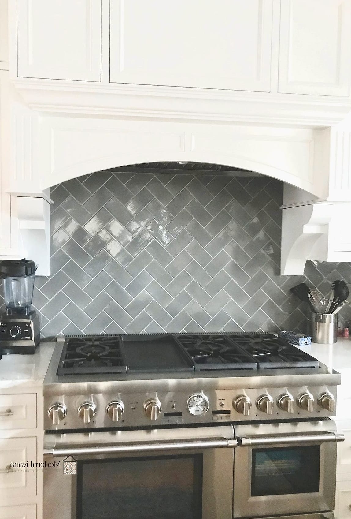 Gray Kitchen With Herringbone Backsplash