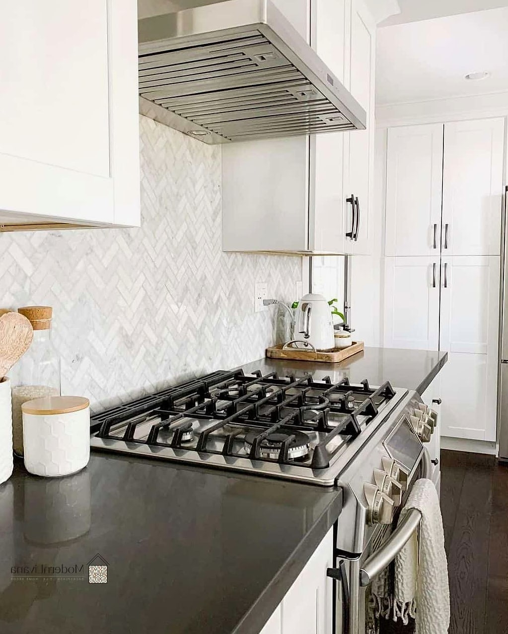 27 Inch Kitchen Ideas That Prove This Trend Is Here to Stay 15 Herringbone Backsplash with Neutral Tile