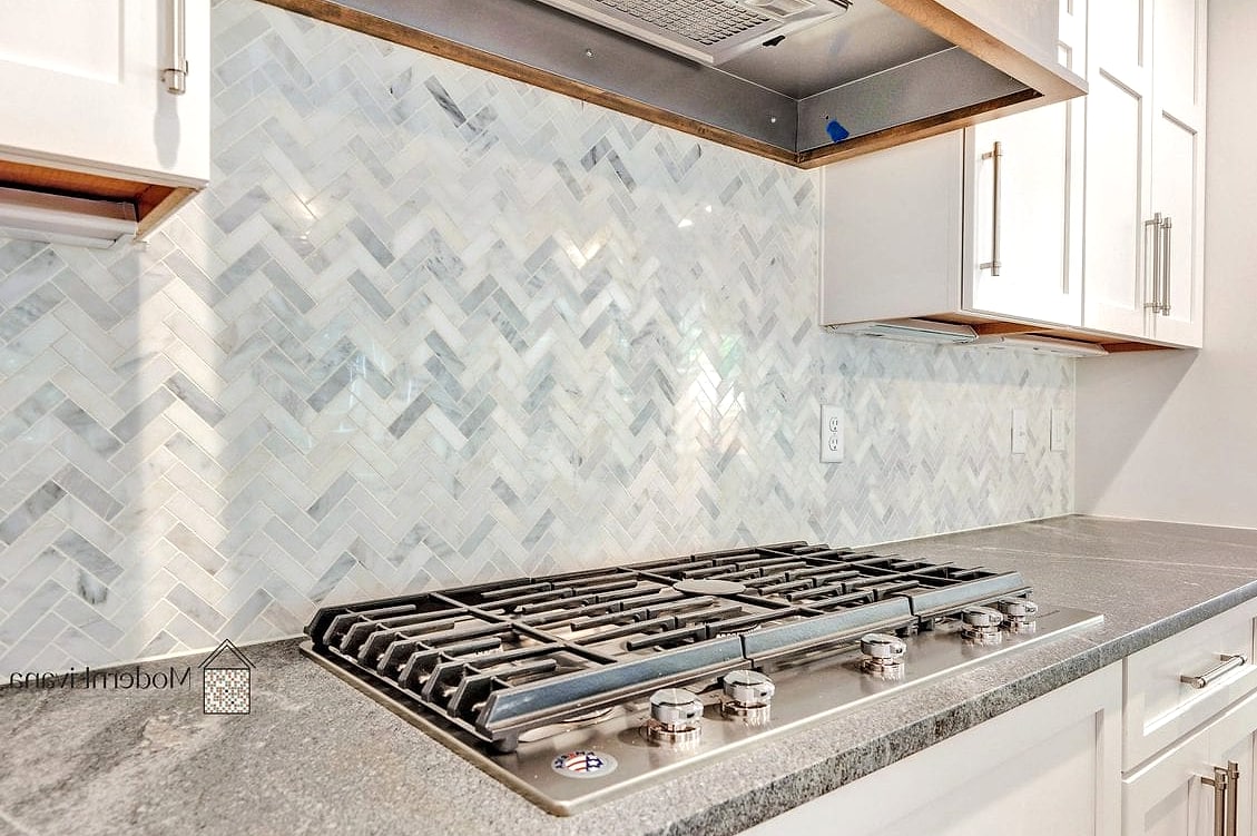 30 Marble Backsplash Ideas That Are Stylish and Practical 3 Herringbone Marble Tile Pattern