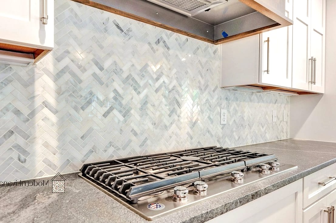 23 Marble Backsplash Ideas That Are Stylish and Practical 4 Herringbone Marble Tile Pattern