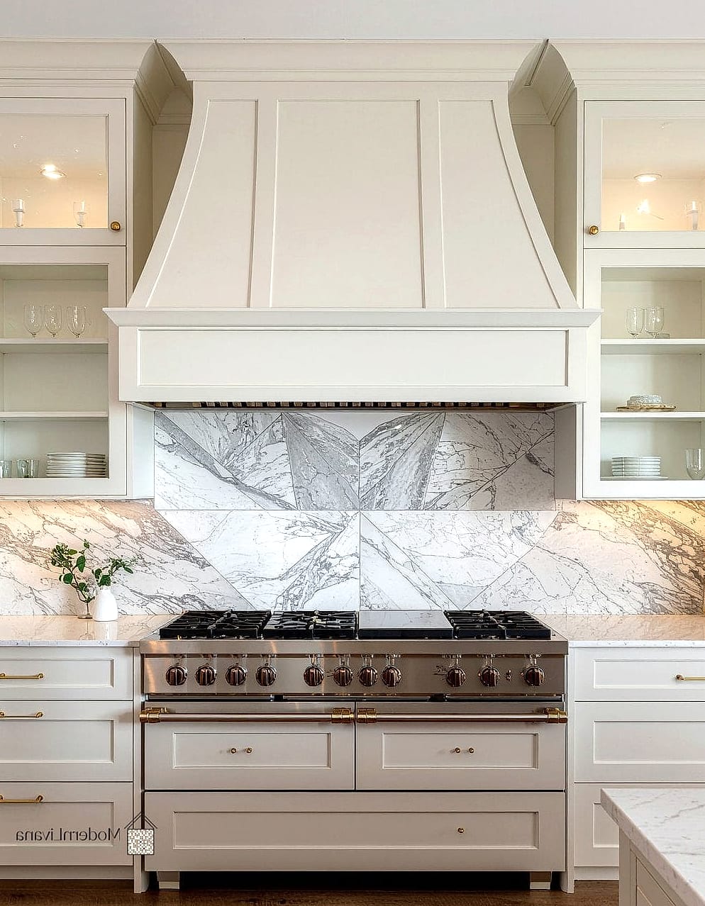 27 White Quartz Backsplash Ideas for Every Home Style and Budget 22 Luxury Look with Bookmatched Veining