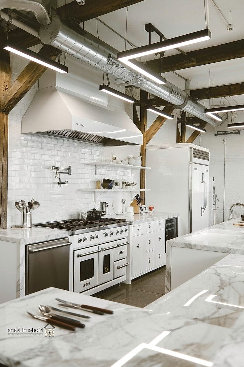 25 Industrial Kitchen Ideas From Homes We Absolutely Love 16 Marble and Steel Contrast