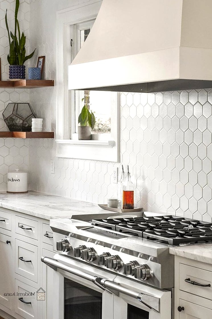 Small Half-Bath Hexagon Backsplash Behind a Pedestal Sink