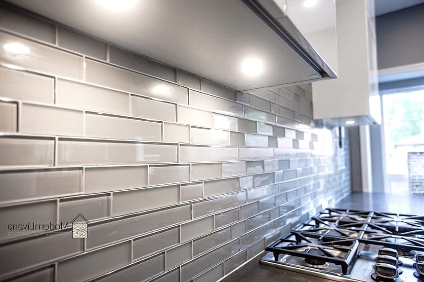 25 Modern Glass Tile Ideas That Look Expensive But Aren't 3 Soft Gray Glass Tile Backsplash