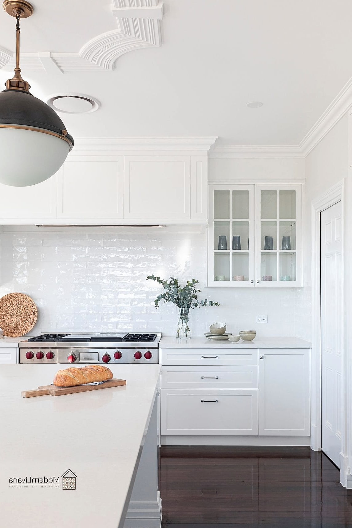 Vertical Subway Tile with Dark Quartz Countertop