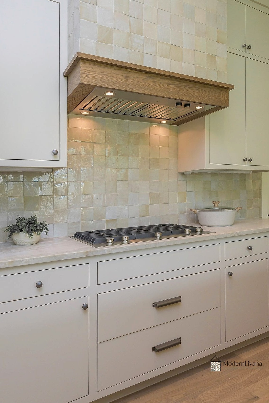 22 White Chevron Backsplash Ideas That Maximize Style and Function 7 6. White Chevron Zellige Tile Backsplash