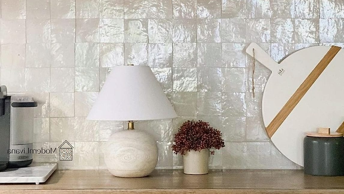 27 White Glass Metal Backsplash Ideas That Are Absolutely Worth It 13 White Glass Zellige-Inspired Backsplash With Metal Trim
