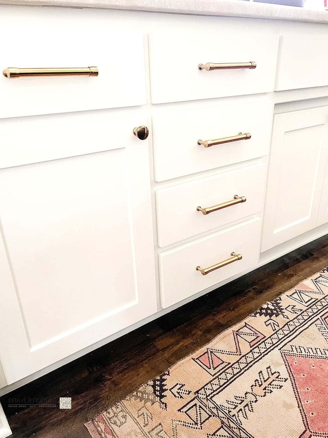 White Kitchen with Brass Hardware