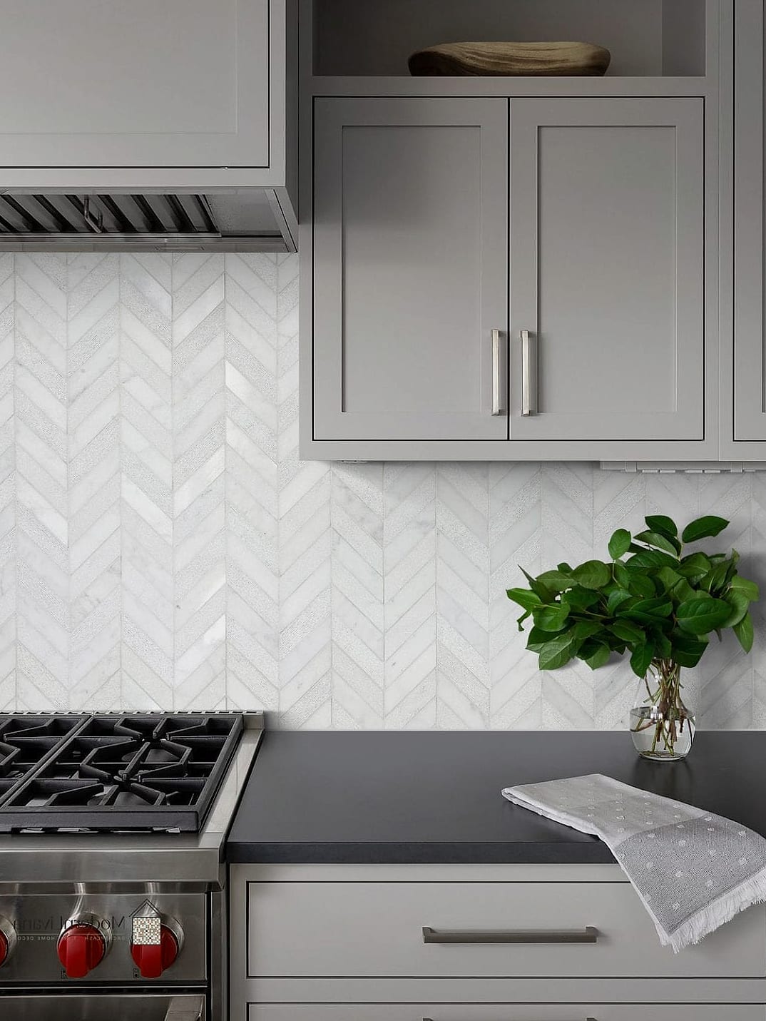 White Marble Chevron with Dark Cabinets