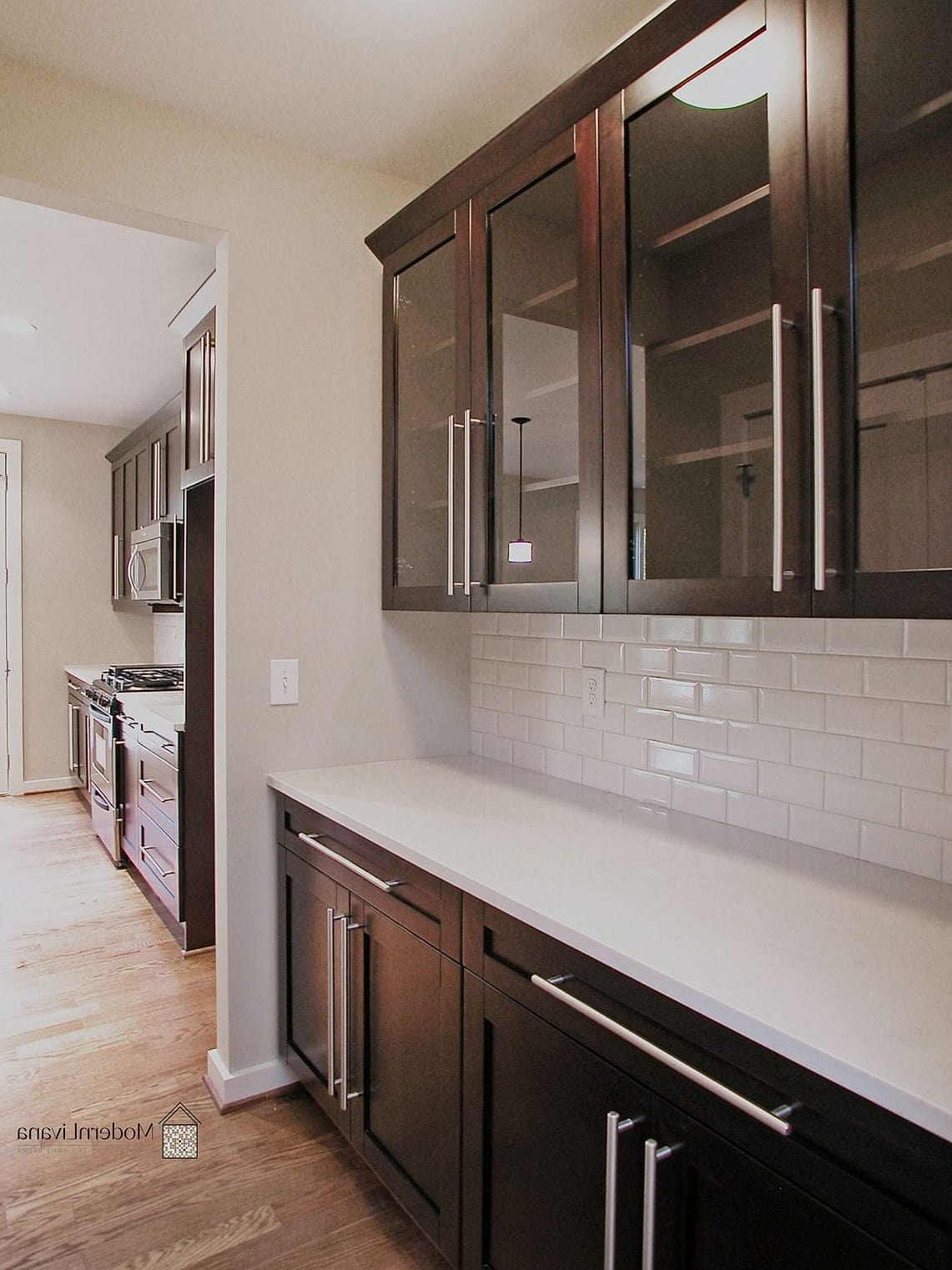 White Oak Accent Wall with Tile Behind the Range