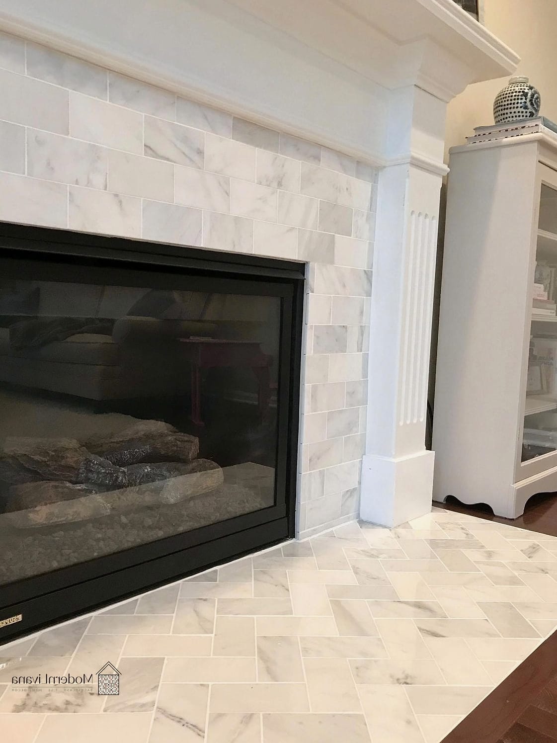White Porcelain Tile Around a Fireplace
