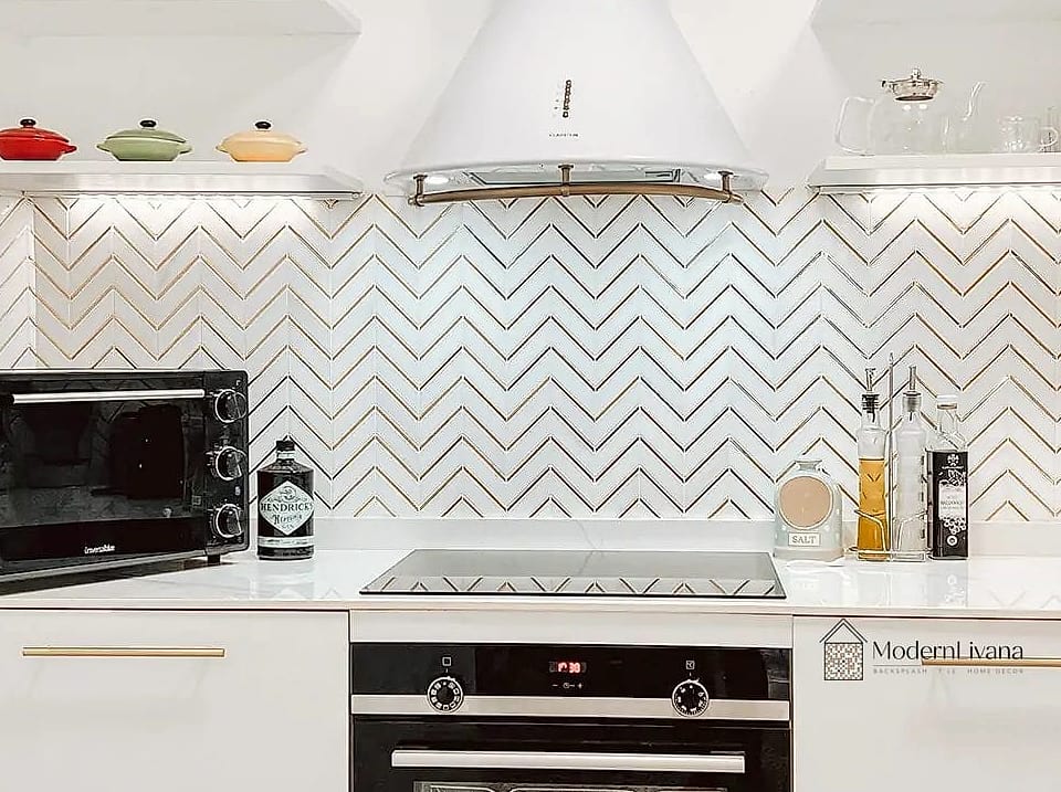 22 White Chevron Backsplash Ideas That Maximize Style and Function 13 12. White Porcelain Chevron Backsplash
