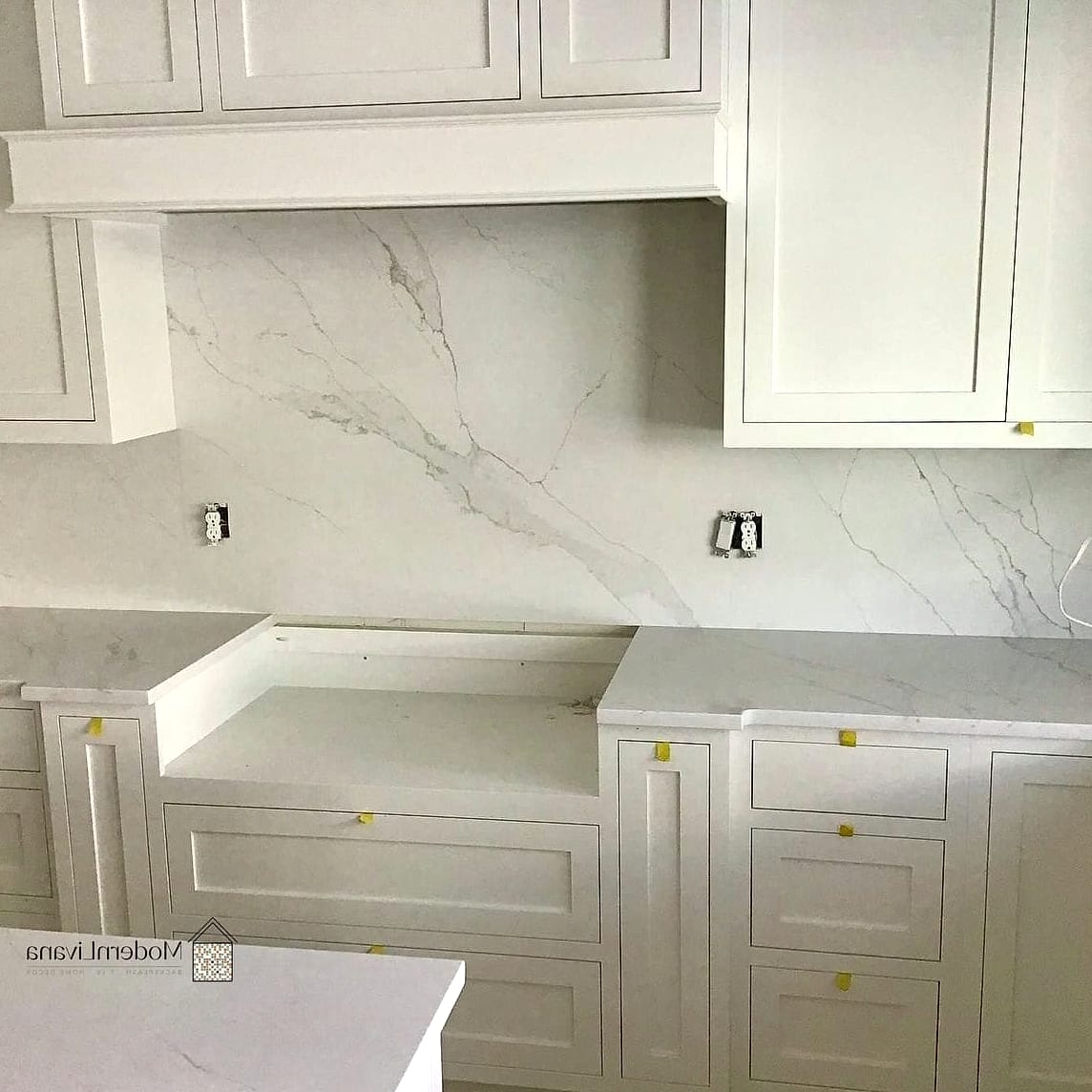 27 White Quartz Backsplash Ideas for Every Home Style and Budget 7 White Quartz with Bold Dramatic Veins