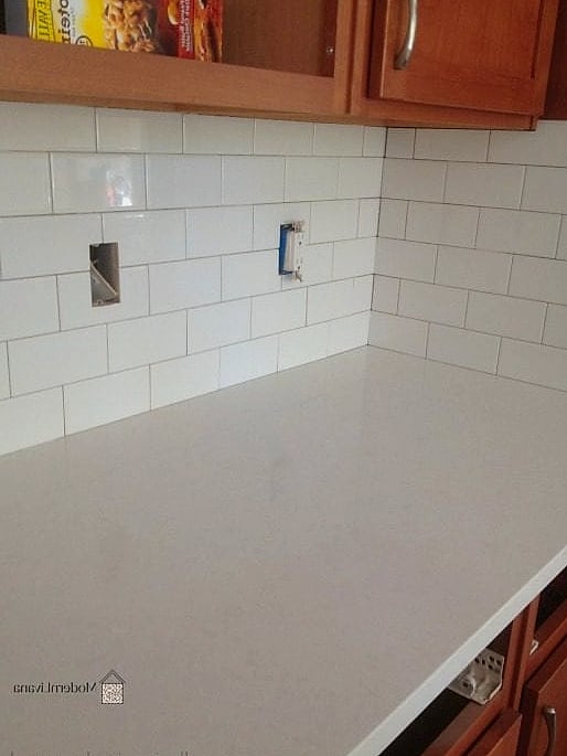 White Quartz Countertop with Classic White Subway Tile