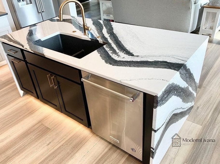 Black Cabinets with White Quartz Waterfall Countertop