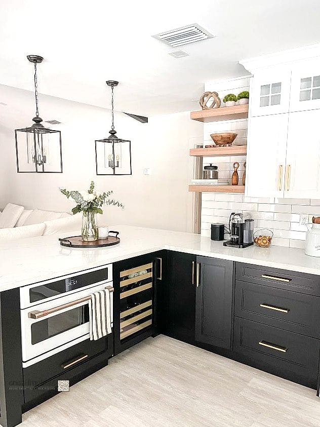 Black Lower Cabinets with Open White Shelving Above