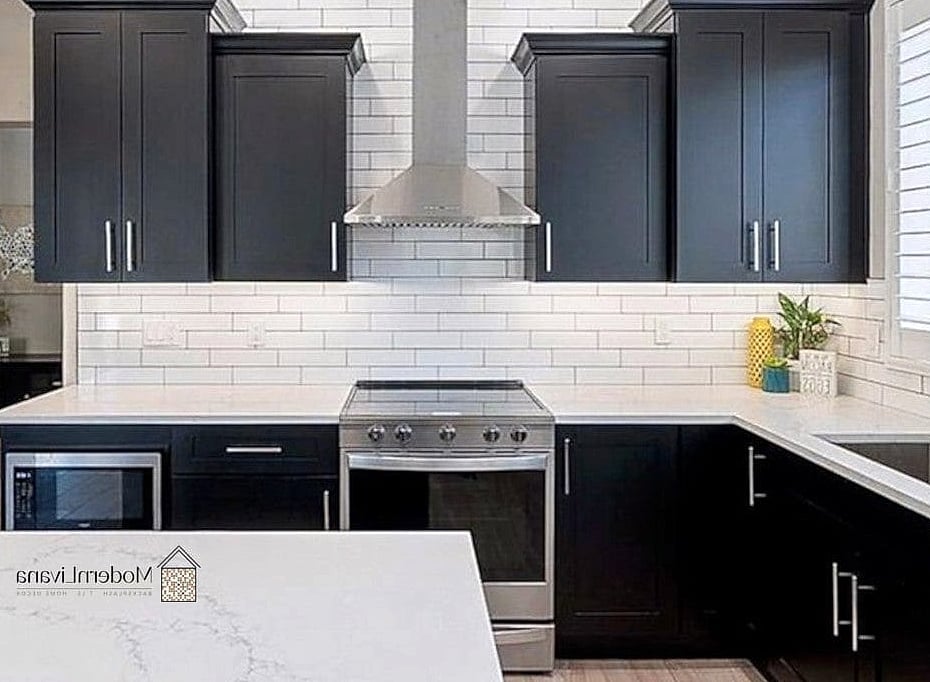 Black Shaker Cabinets with White Subway Tile Backsplash