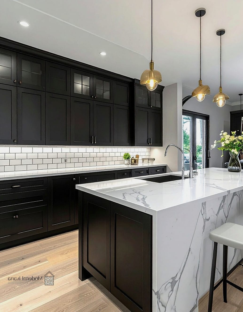 Black Shaker Cabinets with Marble Countertops