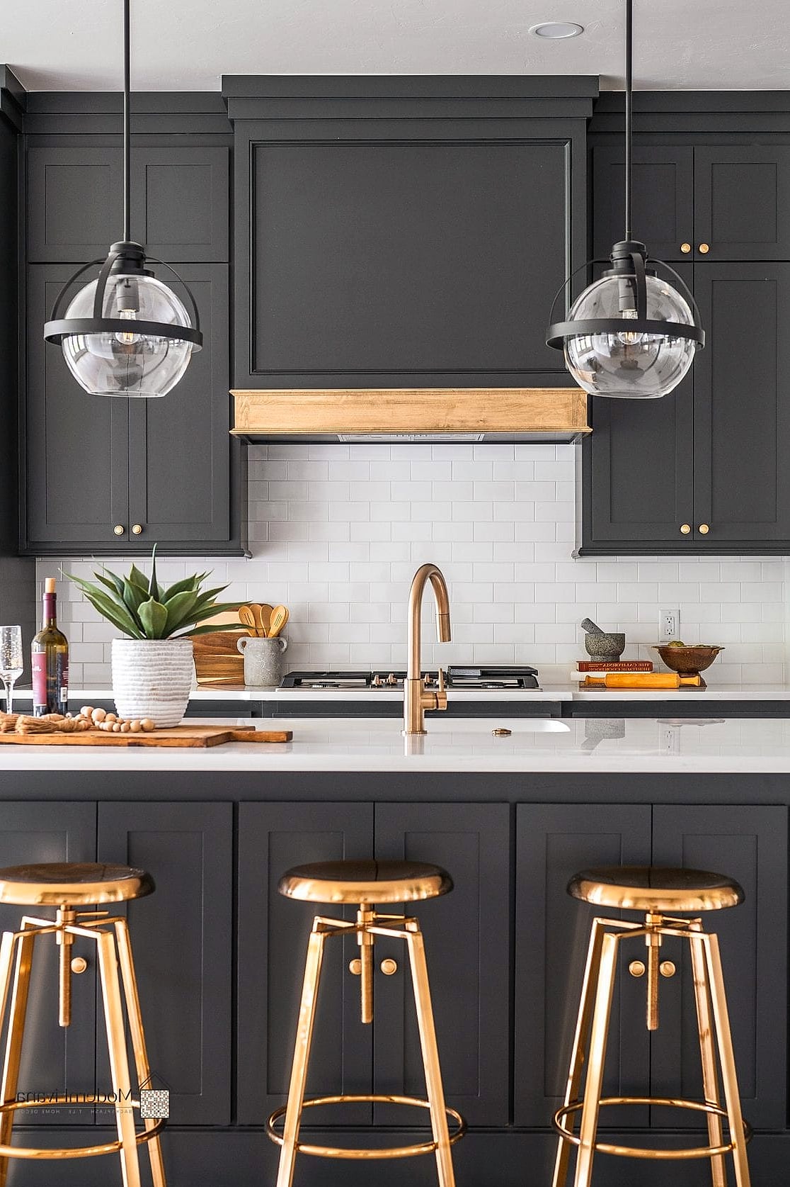Brass Hardware with a Black Kitchen Island