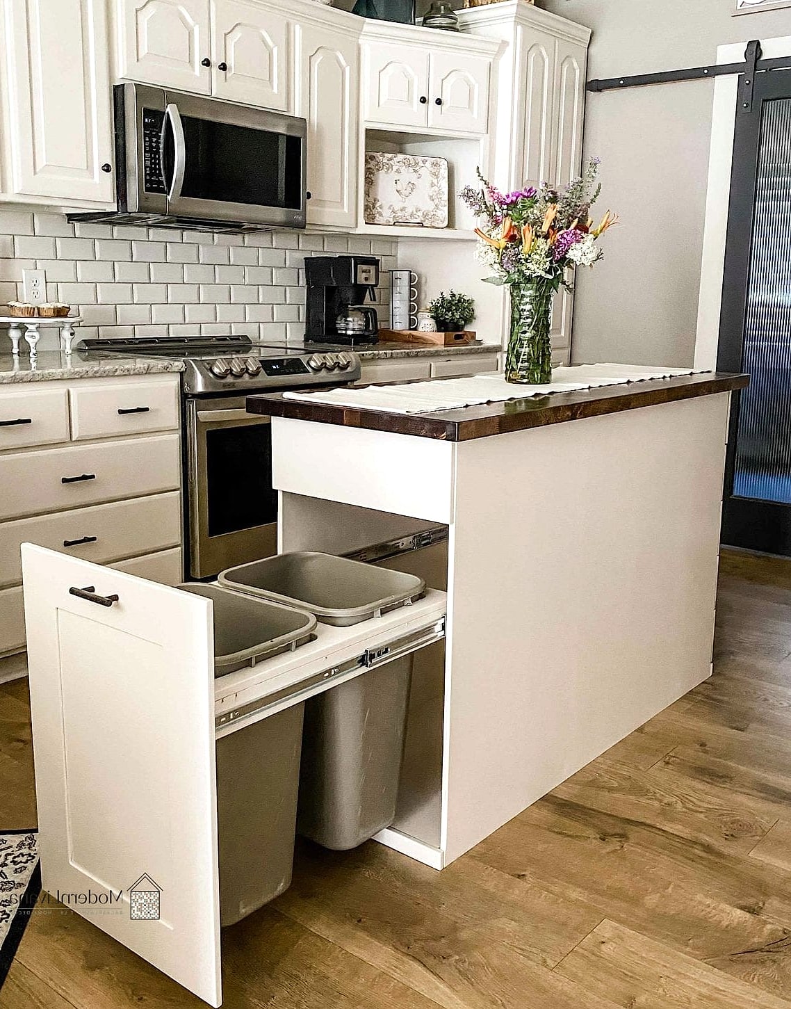 27 Kitchen Island Ideas That Designers Keep Coming Back To 25 Built-In Trash and Recycling Pullout