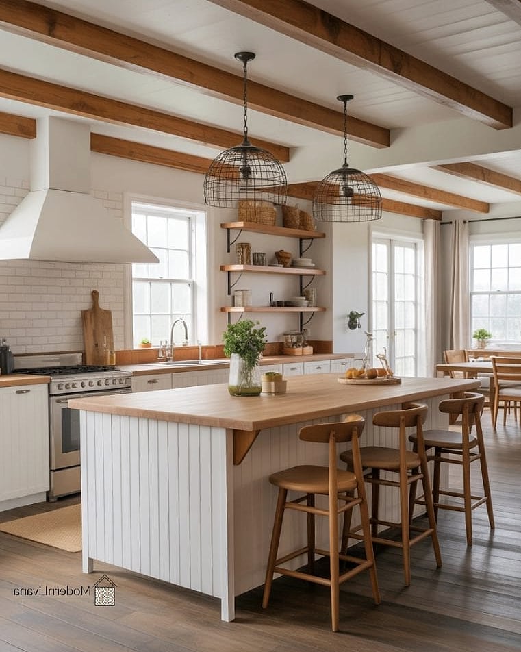 A Butcher Block Peninsula With a Waterfall Marble Island