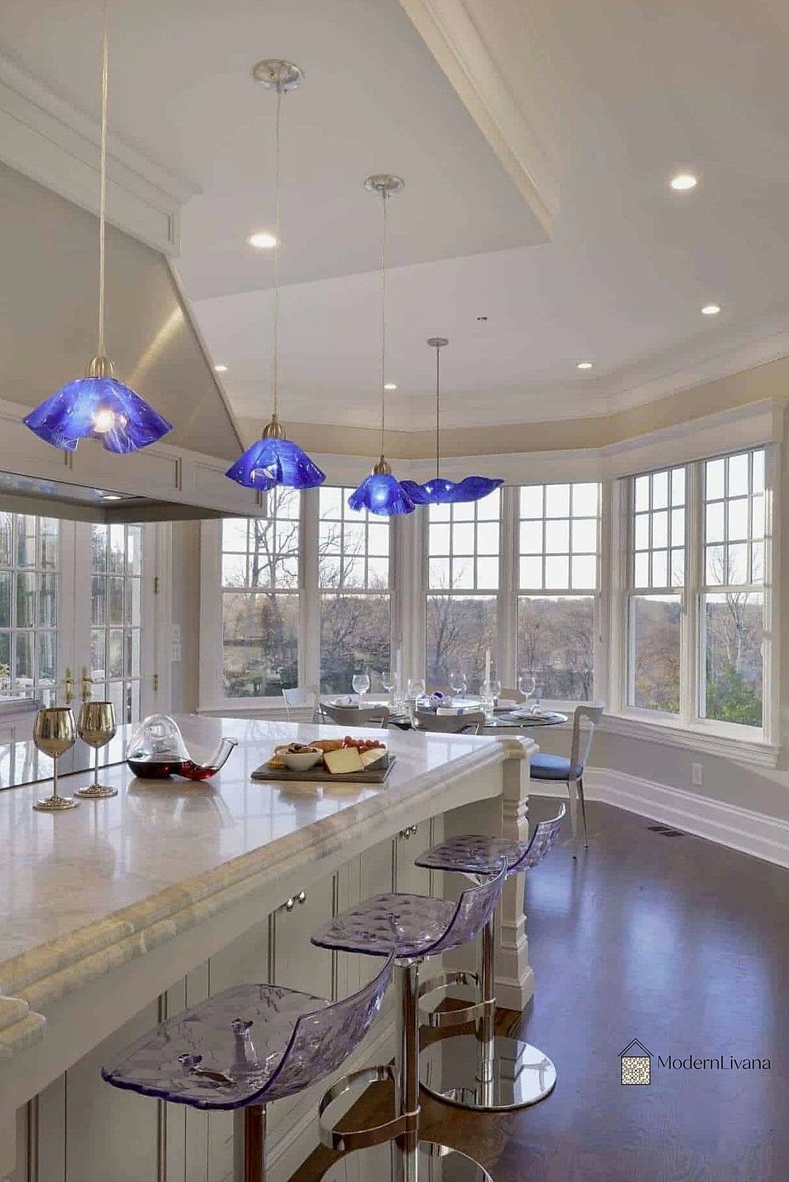 23 Blue and White Kitchen Ideas to Show Your Contractor 5 Cobalt Blue Pendant Lights Over a White Island
