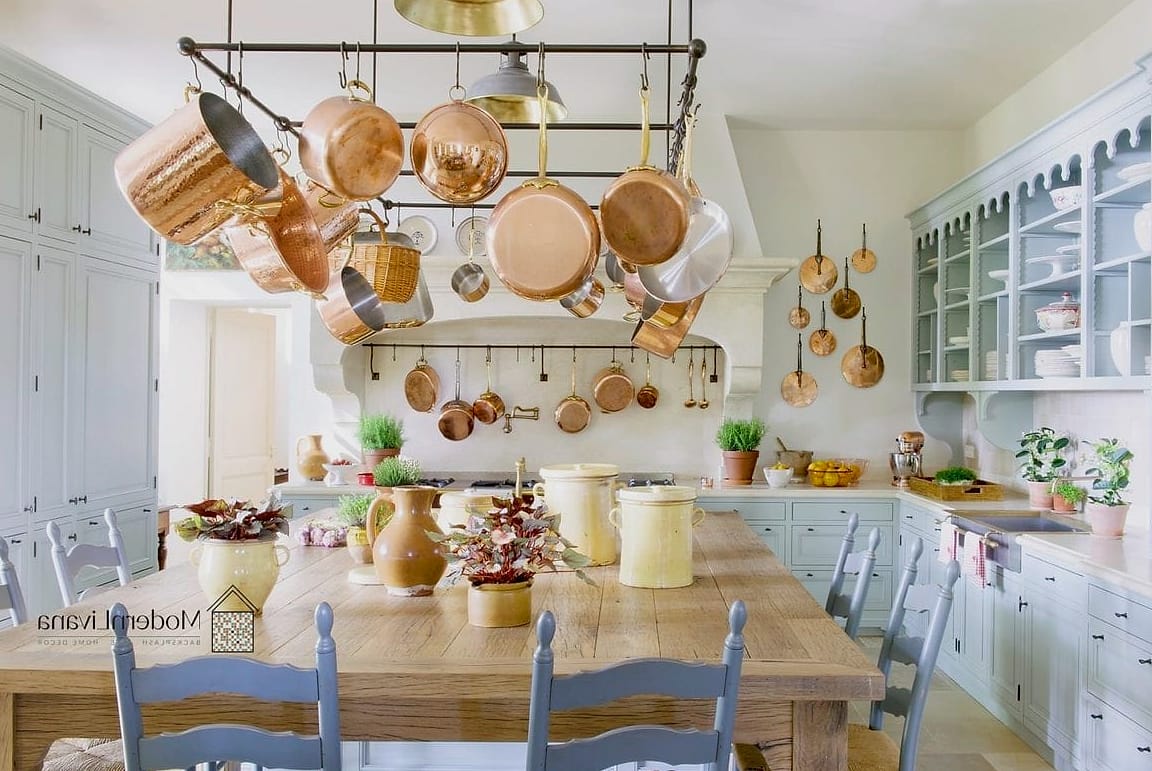 29 Colorful Kitchen Ideas That Look Expensive But Aren't 23 Copper Pots as Open Storage Decor