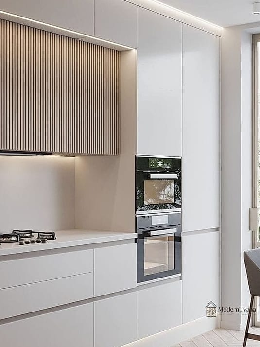 10 Modern White Kitchen Ideas You'll Want to Save Right Now 4 Fluted or Ribbed Cabinet Fronts