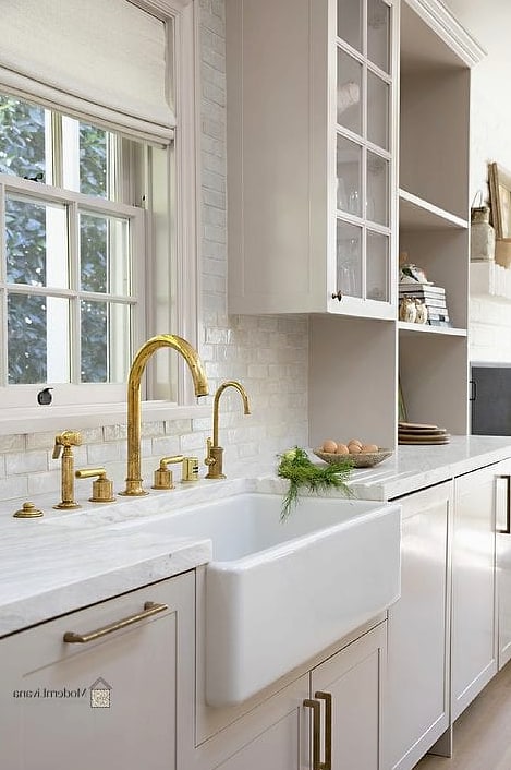 Gray Kitchen with Brass Faucet