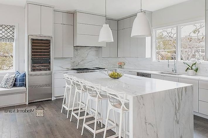 Gray Kitchen with White Waterfall Countertop Edge
