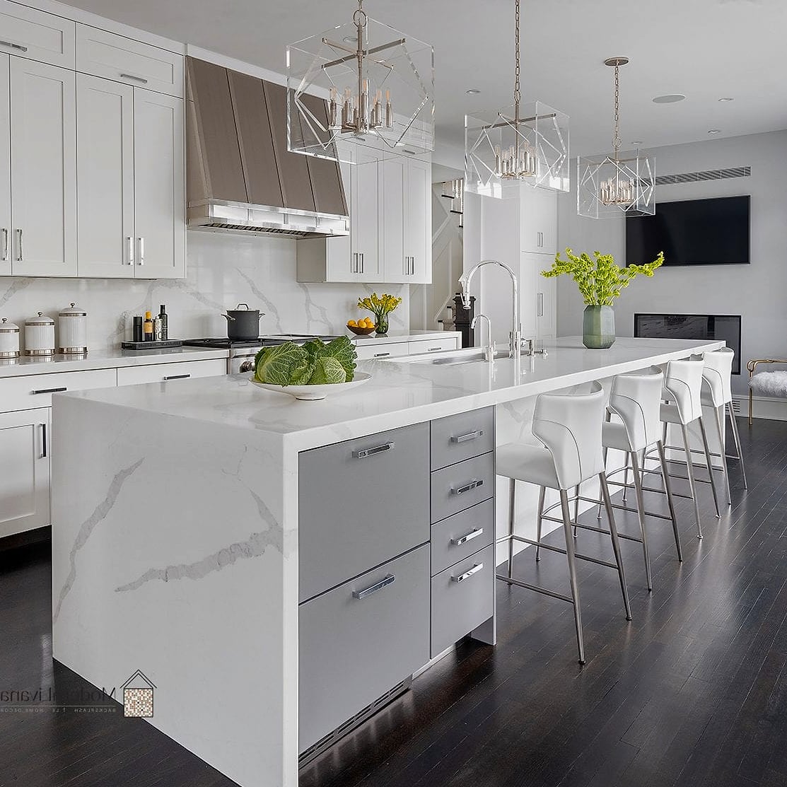 23 Gray and White Kitchen Ideas You'll Want to Save Right Now 8 Gray Kitchen Island with Waterfall Countertop