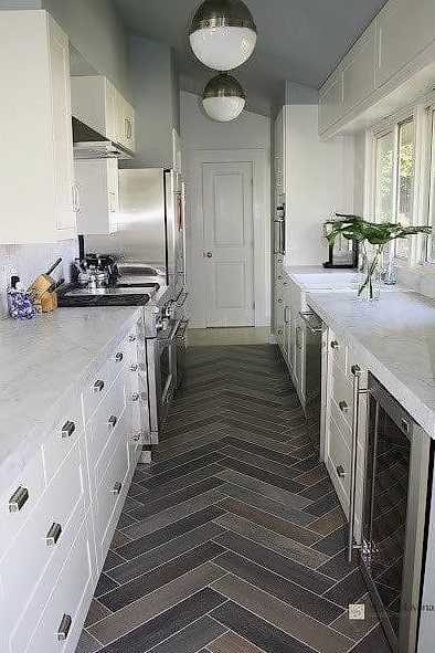 28 Galley Kitchen Ideas Worth Bookmarking Before You Renovate 18 Herringbone Floor Tile
