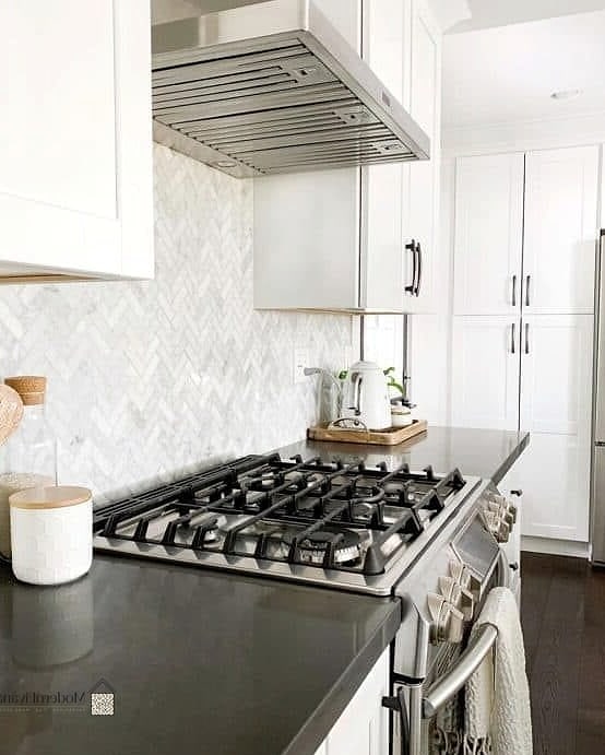Herringbone Tile Backsplash in Gray Tones