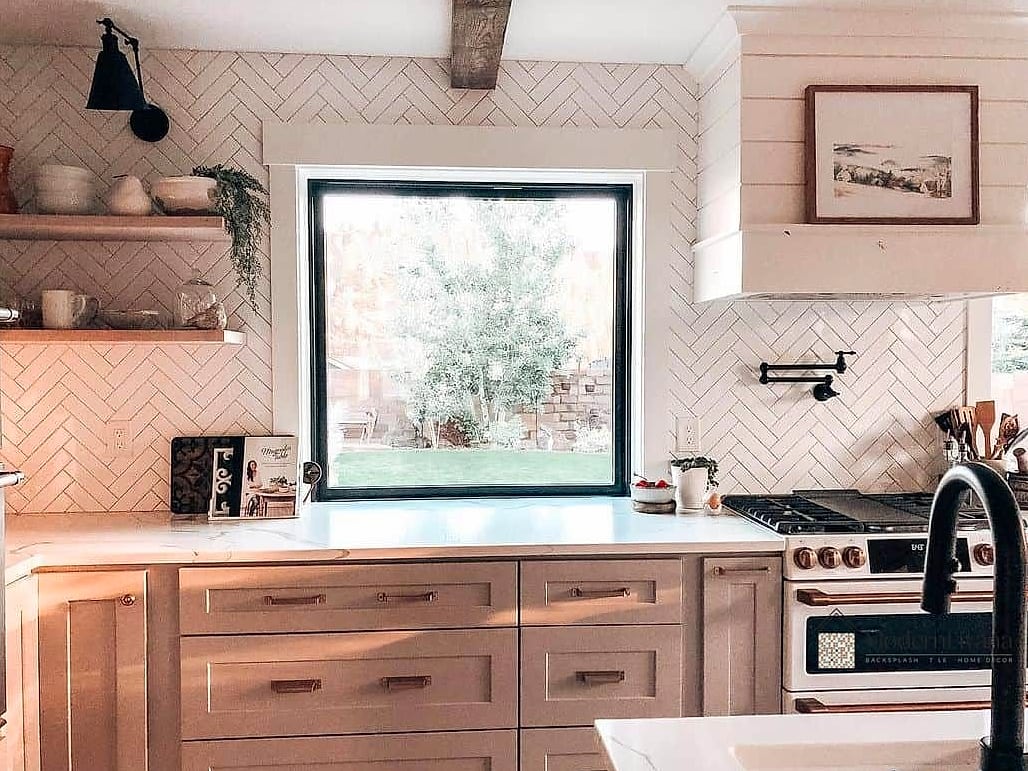 21 Kitchen Window Ideas Worth Stealing From Interior Designers 16 A Herringbone Tile Border Around the Window