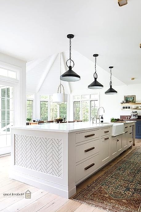 27 Kitchen Island Ideas That Designers Keep Coming Back To 19 Herringbone Tile Backsplash on the Island End