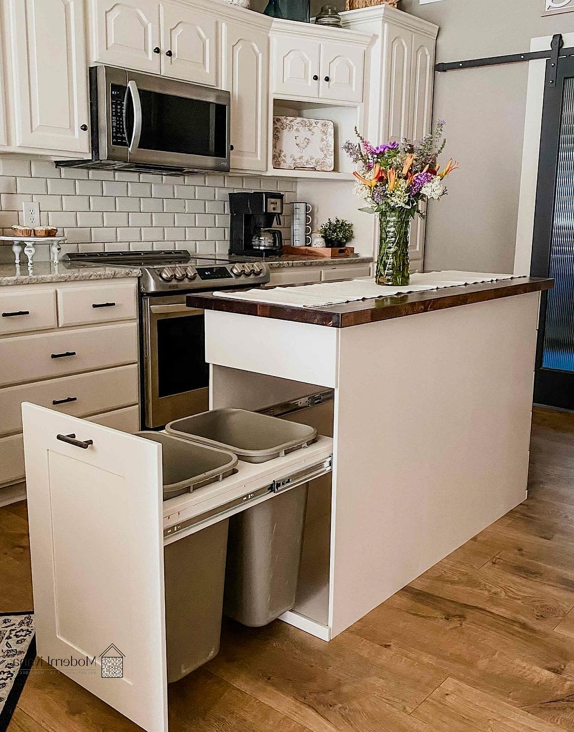 27 Kitchen Island Ideas for Every Home Style and Budget 23 Island with Built-In Trash and Recycling