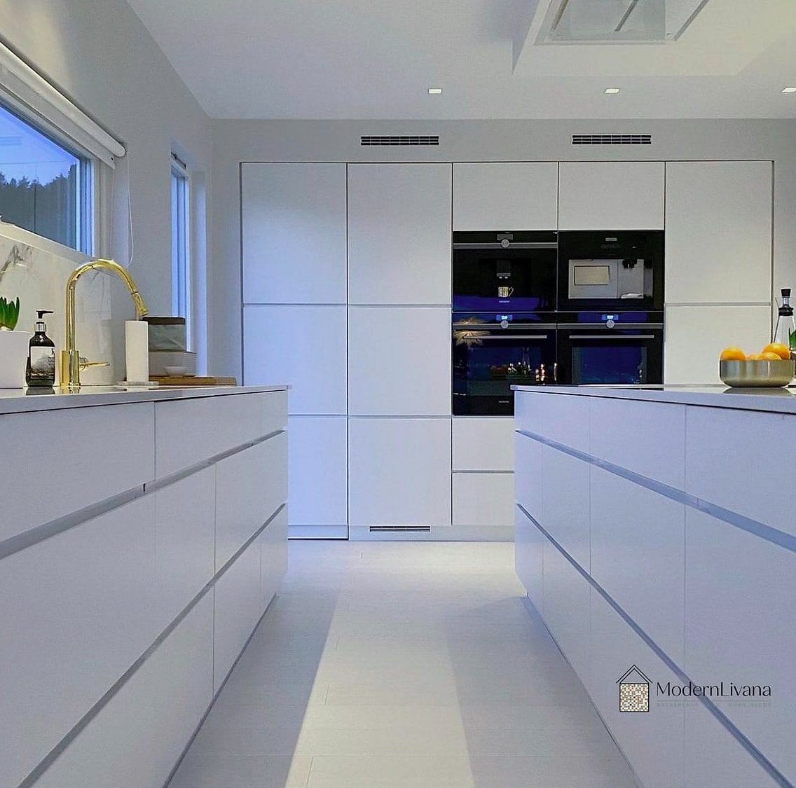 Minimalist White Kitchen with Handleless Cabinets