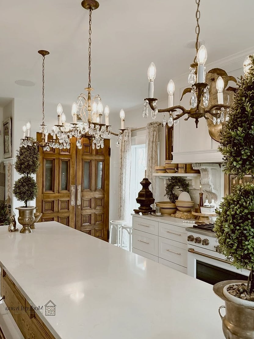 28 Off White Kitchen Ideas You Haven't Seen Before 21 Off White Kitchen with a Vintage Chandelier Over the Island