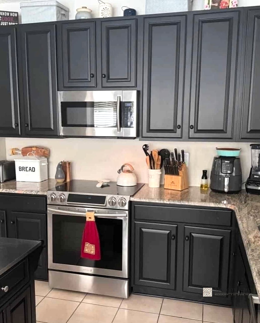 Raised Panel Cabinets with Black Hardware