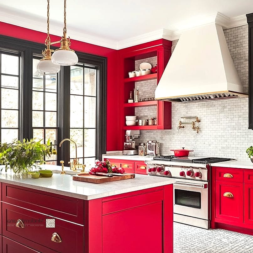 Red Kitchen with Brass Hardware Throughout