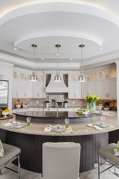 27 Kitchen Island Ideas That Designers Keep Coming Back To 26 Round or Oval Island Shape