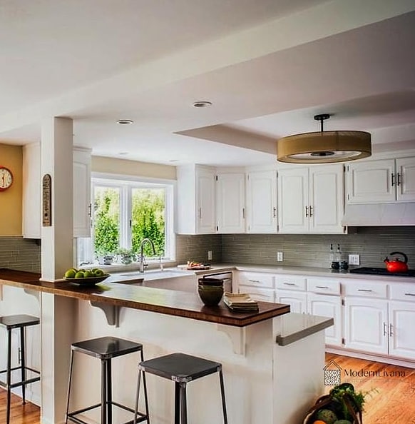 25 Kitchen Peninsula Ideas Stylish Functional Peninsula Ideas Perfect for Any Budget 2 L-Shaped Peninsula with Bar Seating
