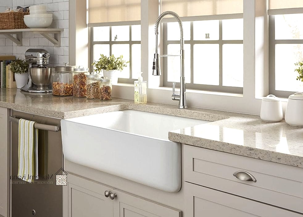 28 White Farmhouse Kitchen Ideas That Look Expensive But Aren't 23 Statement Faucet in Matte Black or Brass